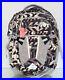 THE-NORTH-FACE-RECON-WOMEN-S-BACKPACK-Vintage-White-Pieces-Print-01-ta