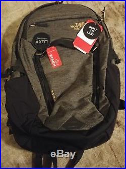 The North Face Women's Surge Luxe Backpack Black Brass Melange/2